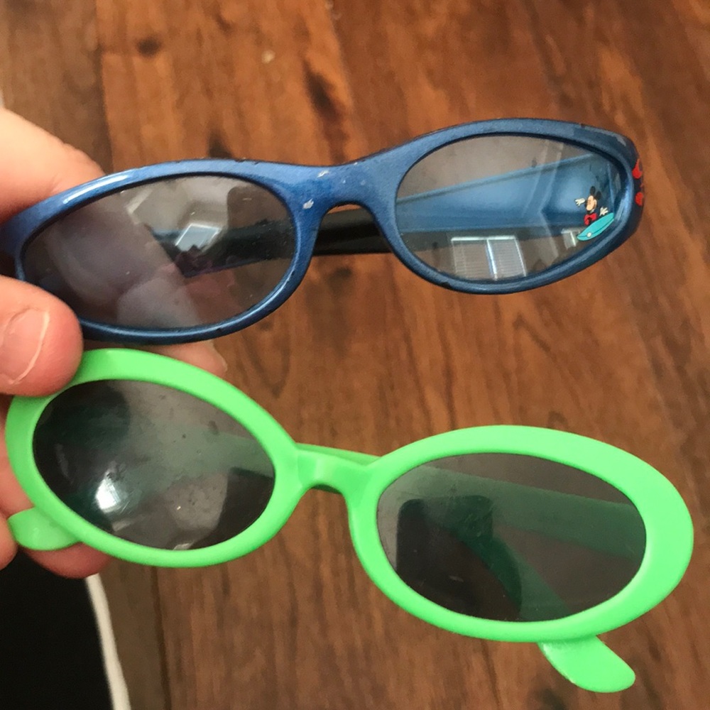 B1G1   2 pairs sunglasses Mickey and another